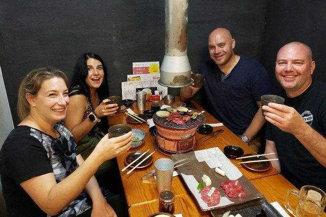 Tokyo Night Foodie Tour in Shinjuku - Seasonal Sushi, Wagyu Beef - Walking through Kabukicho after dark