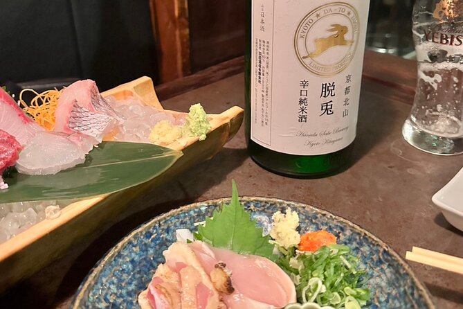 Tokyo: Private Shibuya Bar Crawl Tour -3 Drinks & Local Foods- - A look at Shibuya Crossing during the evening