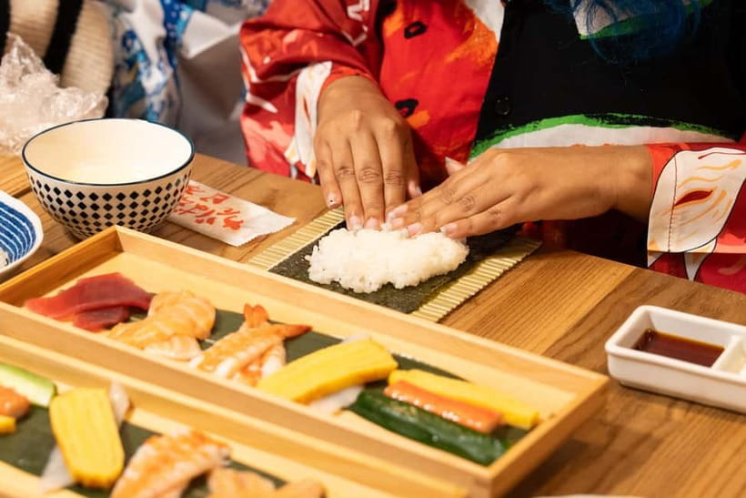 Tokyo: Sushi Making Class in a Happi Coat near a Famous Spot - Group size, atmosphere, and personal attention
