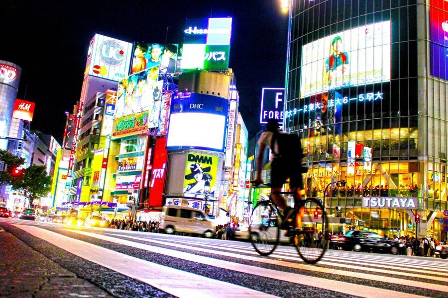 Tokyo: The Best Izakaya Tour in Shibuya - Walking through Shibuya after dark