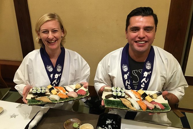 Tsukiji Fish Market Guided Tour and Sushi Making with Pro Chef - Learning sushi in a traditional classroom