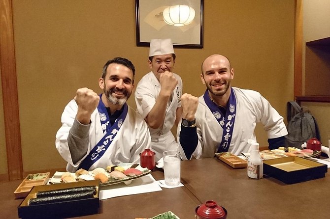 Tsukiji Fish Market Guided Tour and Sushi Making with Pro Chef - Walking through Tsukiji’s outer market