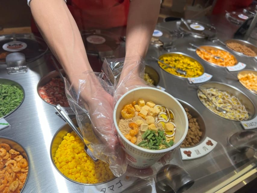 Yokohama: Guided Cup Noodles Museum Tour & Make Your Own Cup - Inside the exhibits: Ando’s invention and the production process
